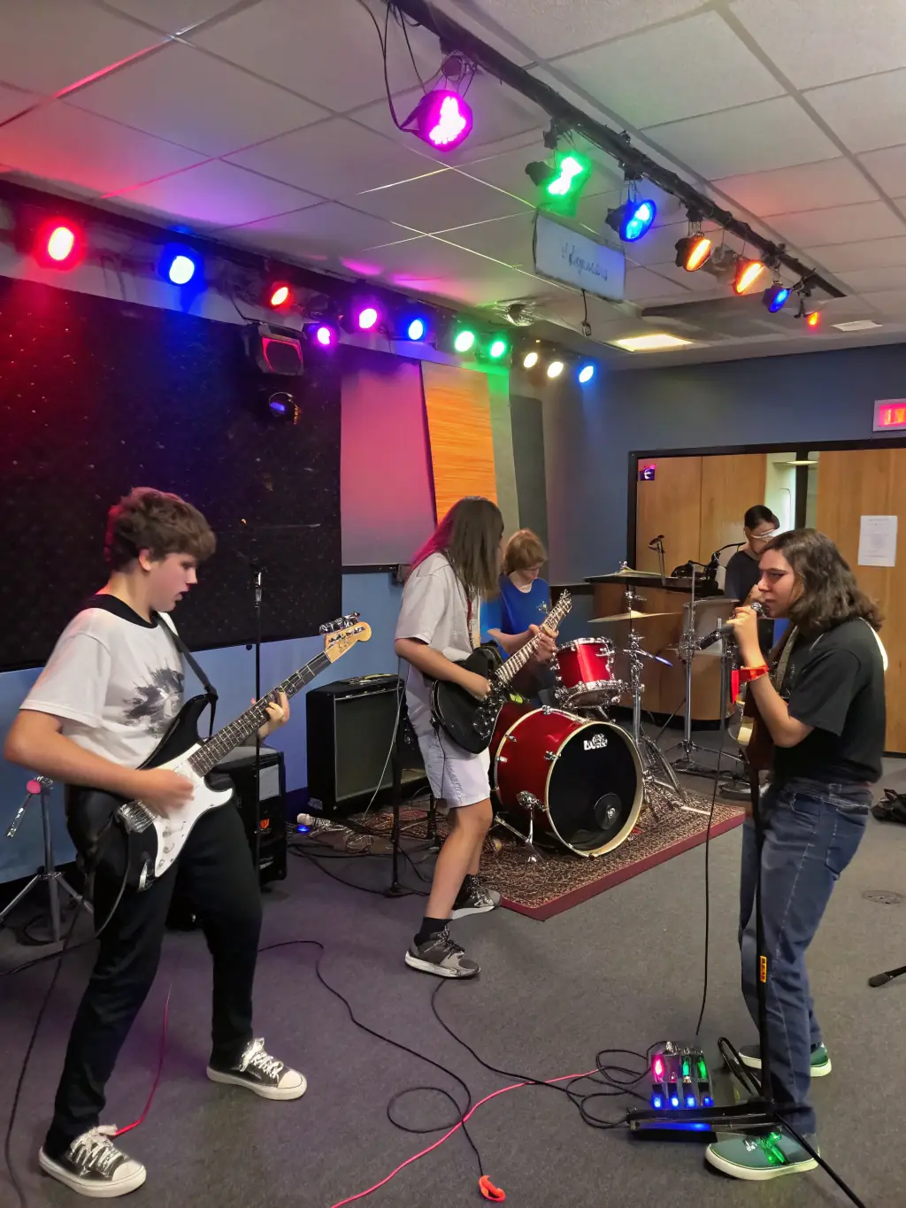 A dynamic image of a group of students performing in a jazz ensemble, capturing the improvisational spirit and collaborative energy of the jazz program at Lyreway.